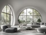 Less is more felsefesiyle tasarlanmış, devasa kemerli pencereleri olan, gri tonlarında modern ve ferah bir minimalist oturma odası tasarımı